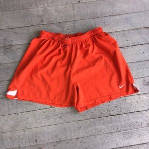 Nike orange athletic team shorts Size Large